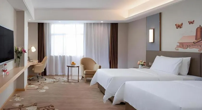 Bed in Vienna Hotel Guangzhou Panyu Square