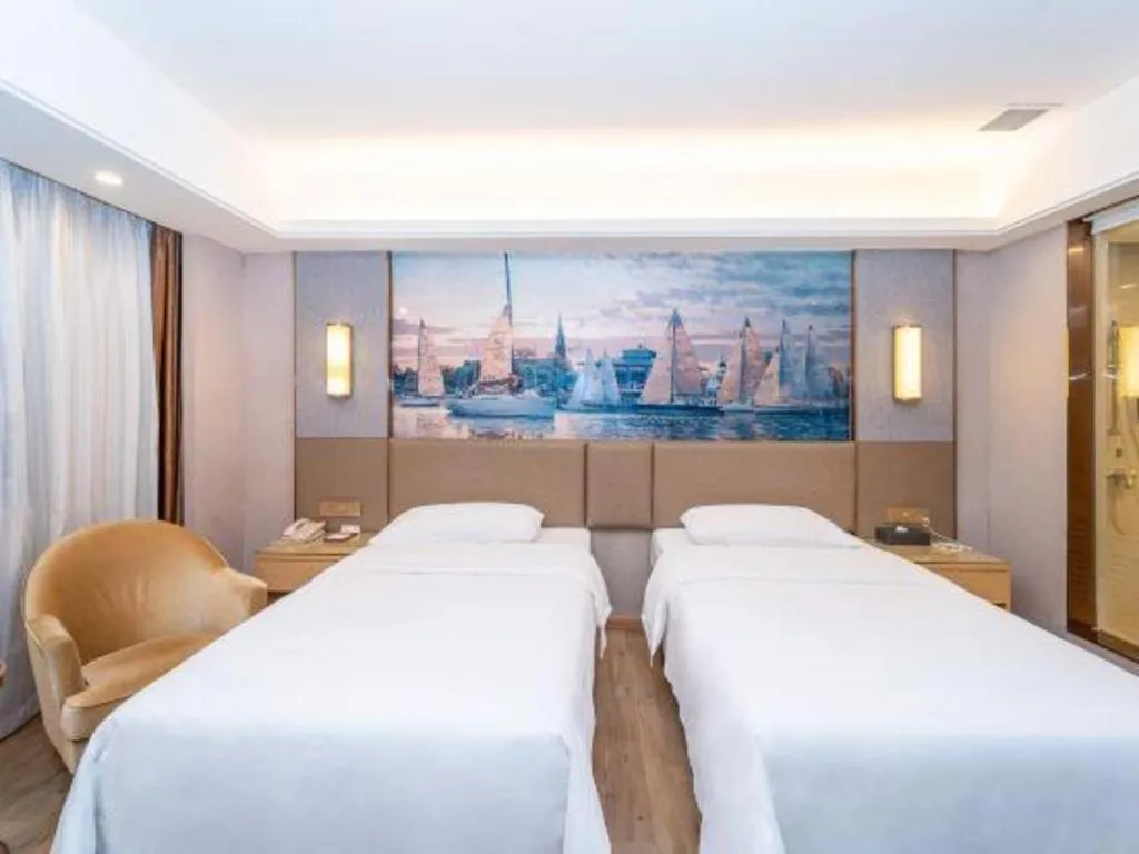 Bed in Vienna Hotel Guangzhou Panyu Square