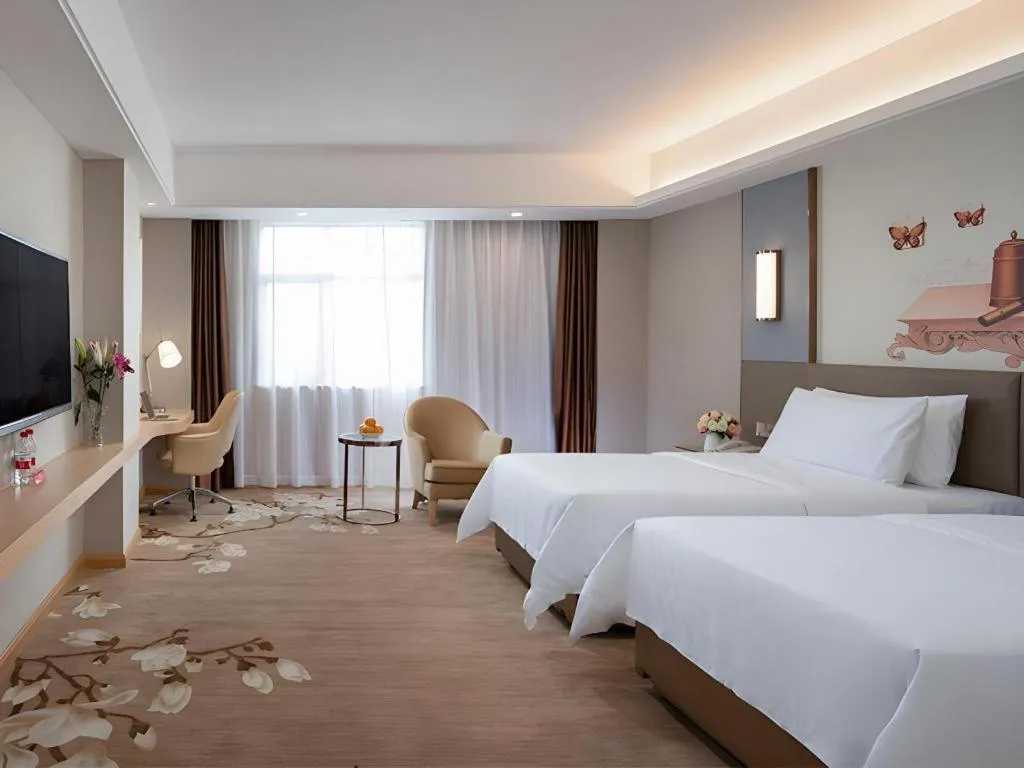 Bed in Vienna Hotel Guangzhou Panyu Square