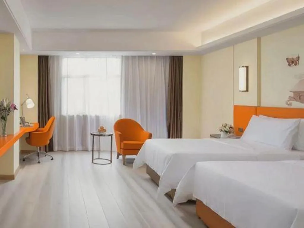 Bed in Vienna Hotel Guangzhou Panyu Square