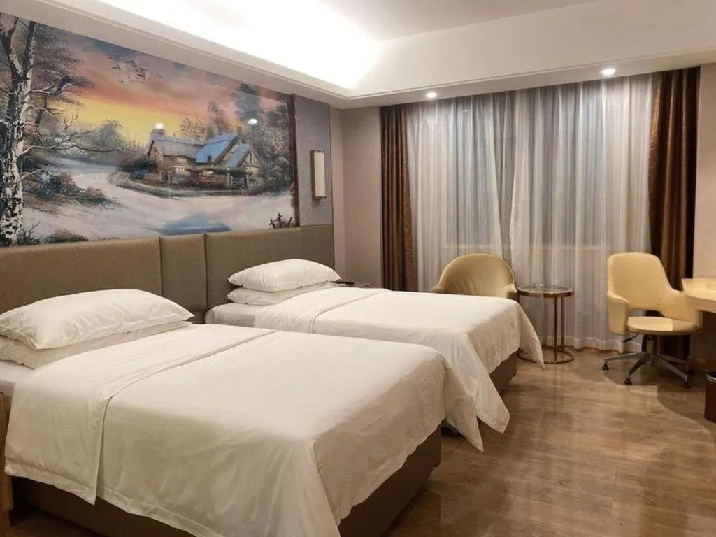 Bed in Vienna Hotel Guangzhou Panyu Square
