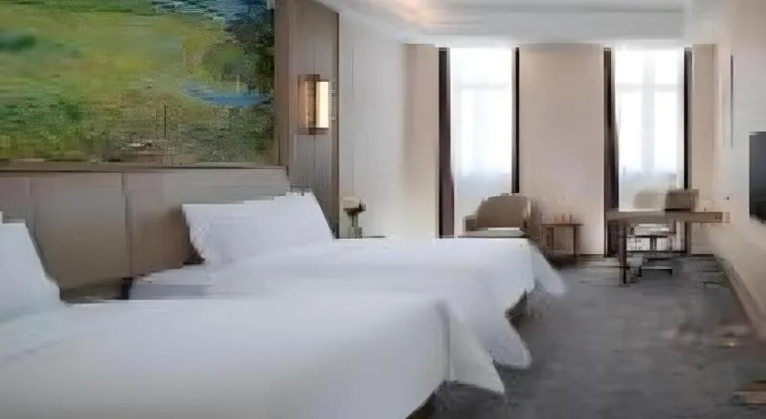 Bed in Vienna Hotel Shenzhen Pingshan Longtian Town
