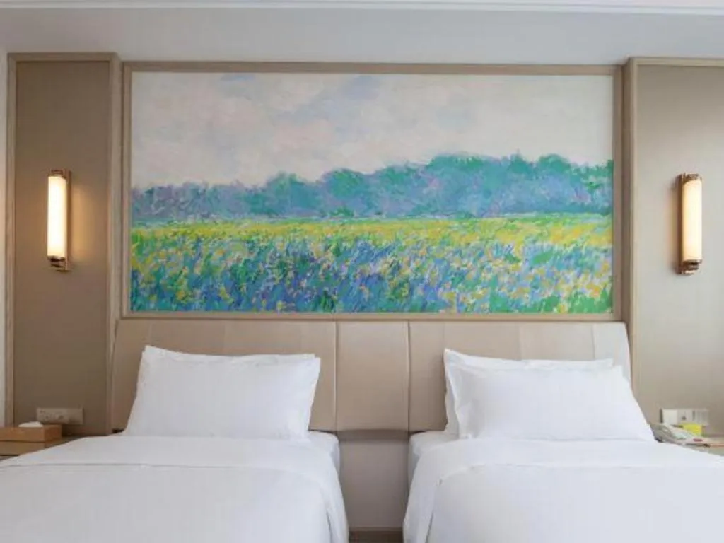 Bed in Vienna Hotel Shenzhen Pingshan Longtian Town