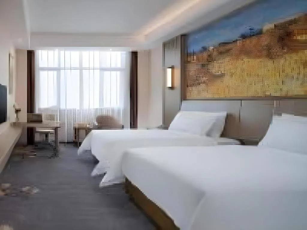 Bed in Vienna Hotel Shenzhen Pingshan Longtian Town