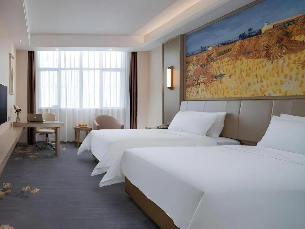 Bed in Vienna Hotel Shenzhen Pingshan Longtian Town