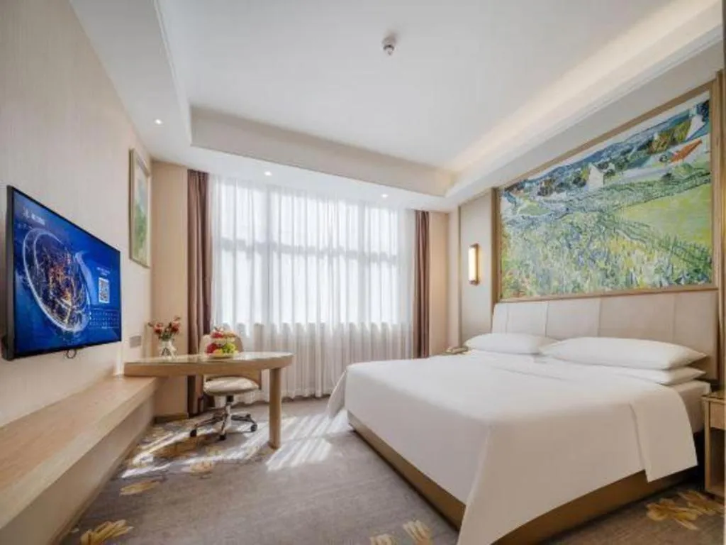 Bed in Vienna Hotel Shenzhen Pingshan Longtian Town
