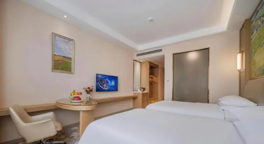 Bed in Vienna Hotel Shenzhen Pingshan Longtian Town