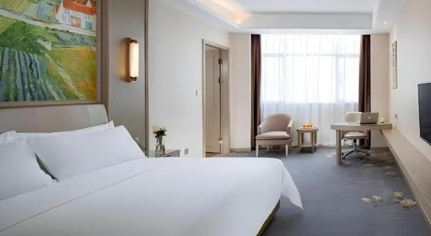 Bed in Vienna Hotel Shenzhen Pingshan Longtian Town