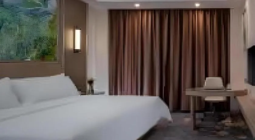 Bed in Vienna Hotel Shenzhen Pingshan Longtian Town