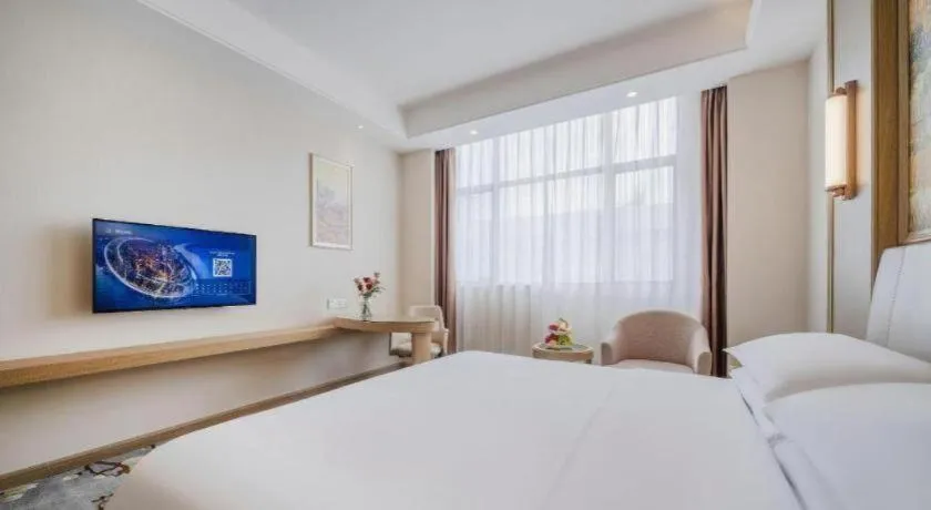 Bed in Vienna Hotel Shenzhen Pingshan Longtian Town