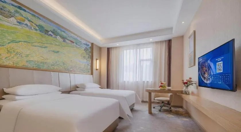 Bed in Vienna Hotel Shenzhen Pingshan Longtian Town