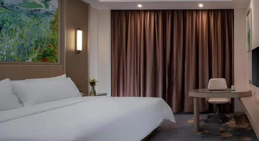 Bed in Vienna Hotel Shenzhen Pingshan Longtian Town