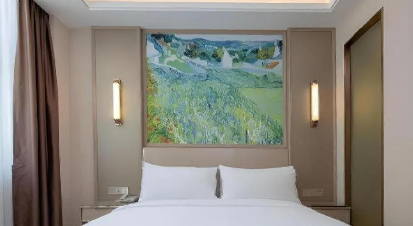 Bed in Vienna Hotel Shenzhen Pingshan Longtian Town