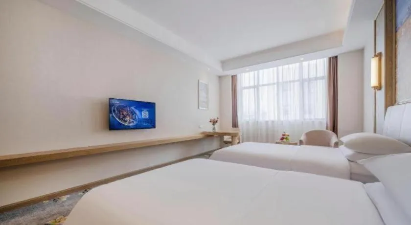 Bed in Vienna Hotel Shenzhen Pingshan Longtian Town