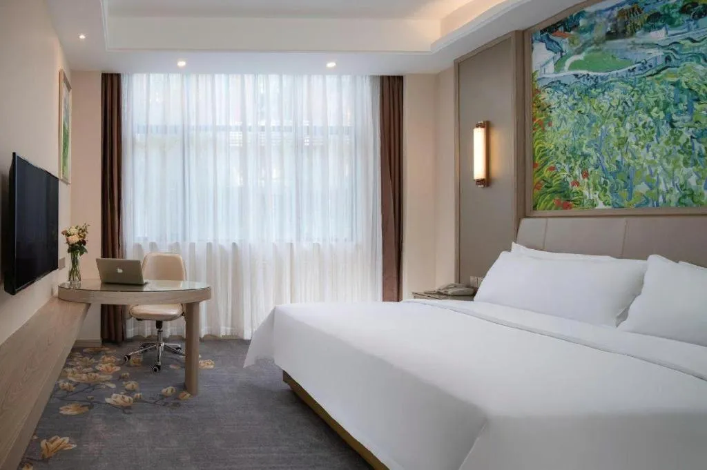Bed in Vienna Hotel Shenzhen Pingshan Longtian Town
