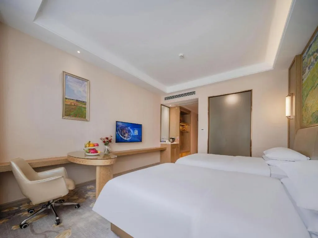 Bed in Vienna Hotel Shenzhen Pingshan Longtian Town