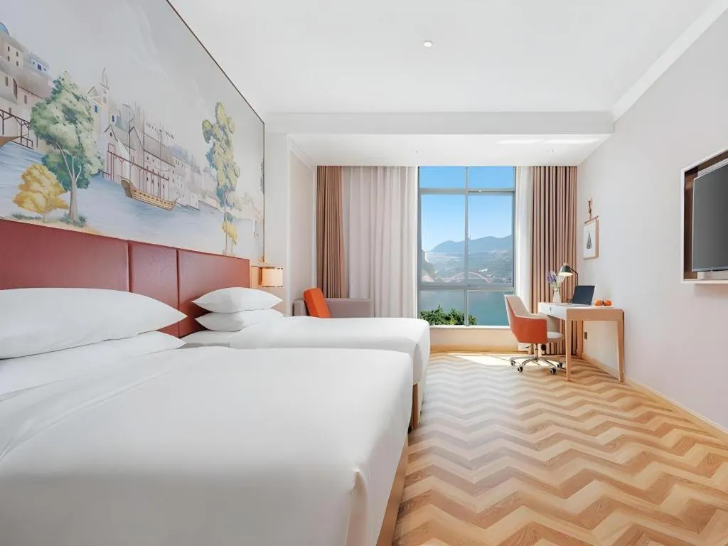 Bed in Vienna Hotel Chongqing Wushan Municipal Government