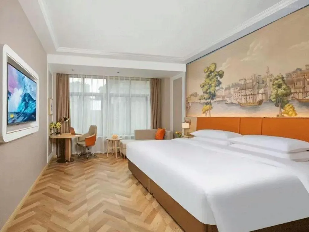 Bed in Vienna Hotel Chongqing Wushan Municipal Government