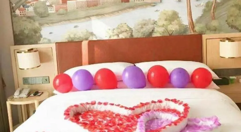 Bed in Vienna Hotel Chongqing Wushan Municipal Government