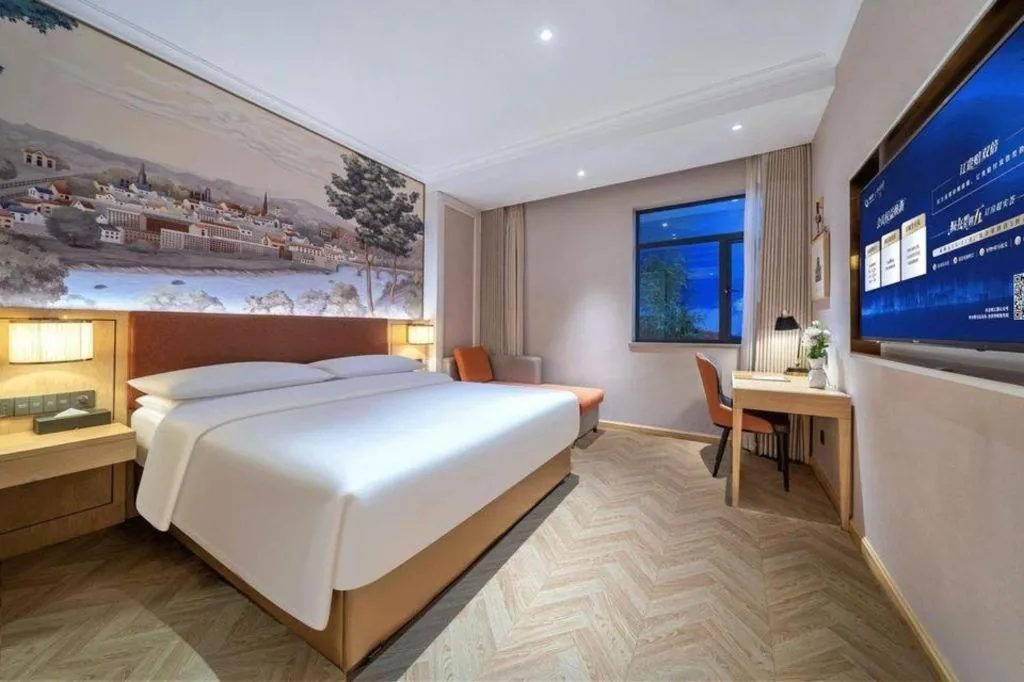 Bed in Vienna Hotel Chongqing Wushan Municipal Government