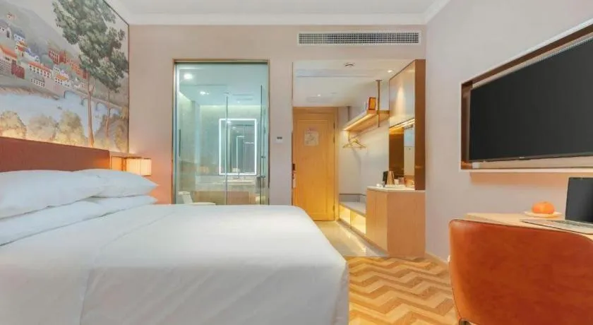 Bed in Vienna Hotel Chongqing Wushan Municipal Government