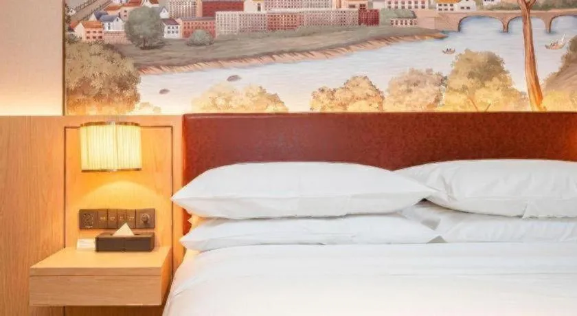 Bed in Vienna Hotel Chongqing Wushan Municipal Government