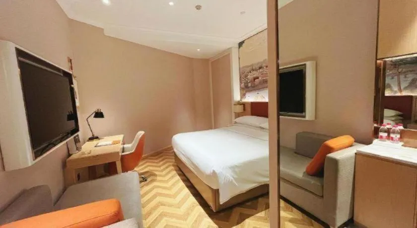 Bed in Vienna Hotel Chongqing Wushan Municipal Government