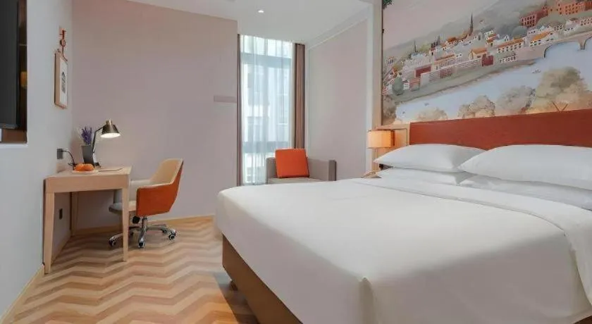 Bed in Vienna Hotel Chongqing Wushan Municipal Government