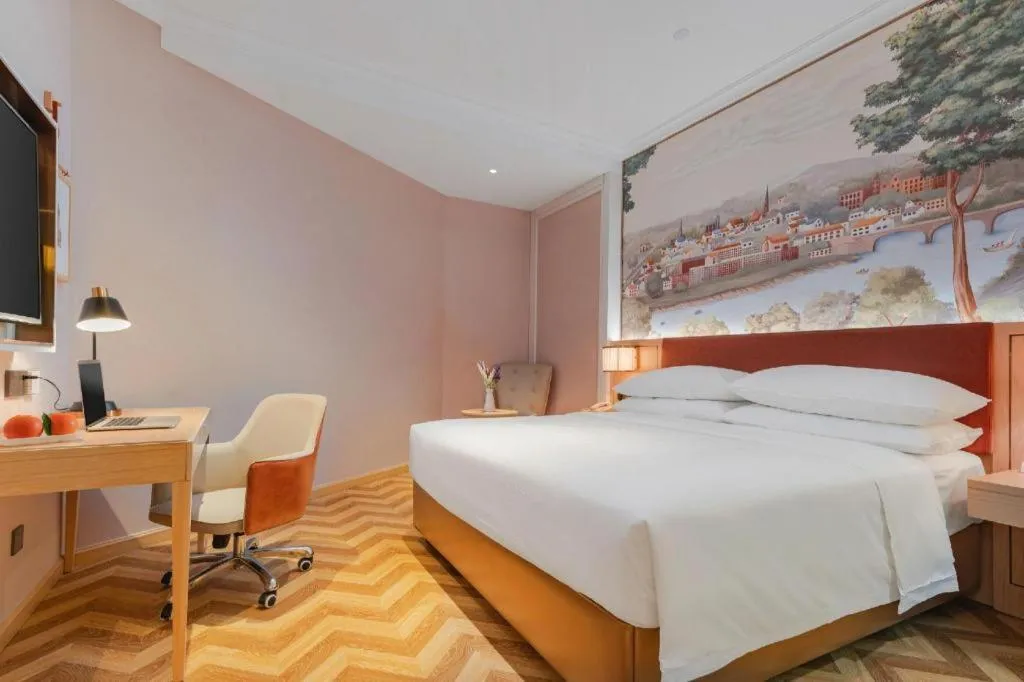 Bed in Vienna Hotel Chongqing Wushan Municipal Government