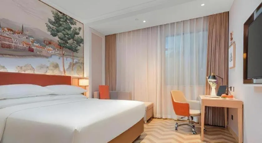 Bed in Vienna Hotel Chongqing Wushan Municipal Government