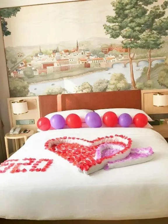 Bed in Vienna Hotel Chongqing Wushan Municipal Government