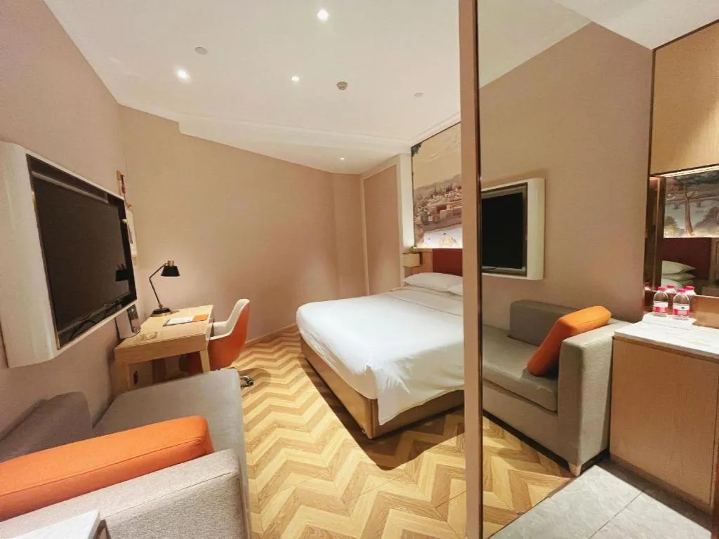 Bed in Vienna Hotel Chongqing Wushan Municipal Government