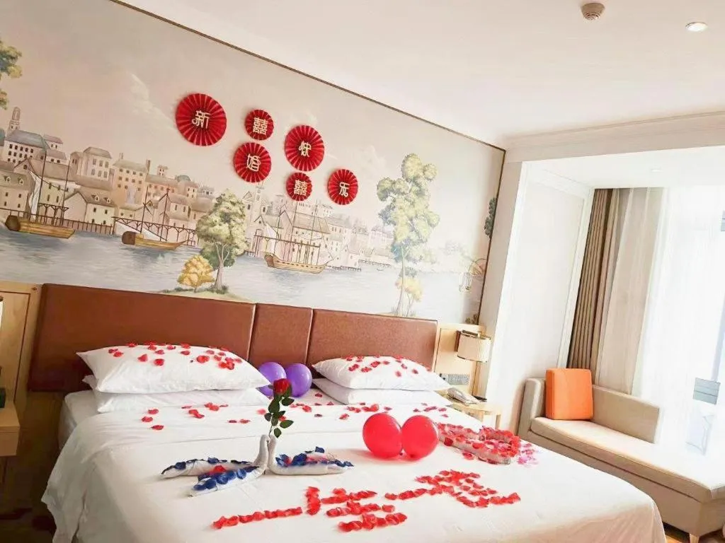 Bed in Vienna Hotel Chongqing Wushan Municipal Government