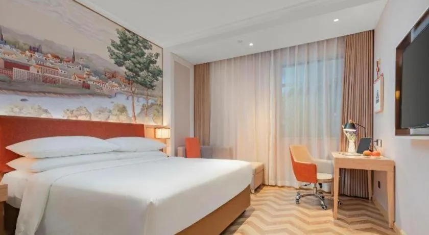 Bed in Vienna Hotel Chongqing Wushan Municipal Government