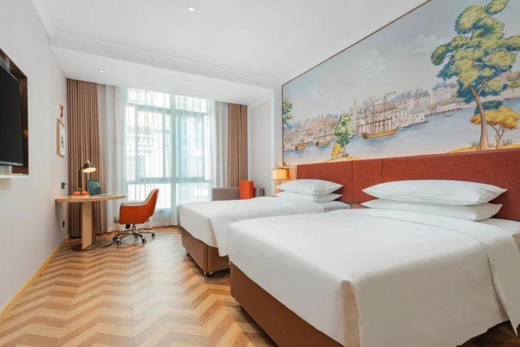 Bed in Vienna Hotel Chongqing Wushan Municipal Government