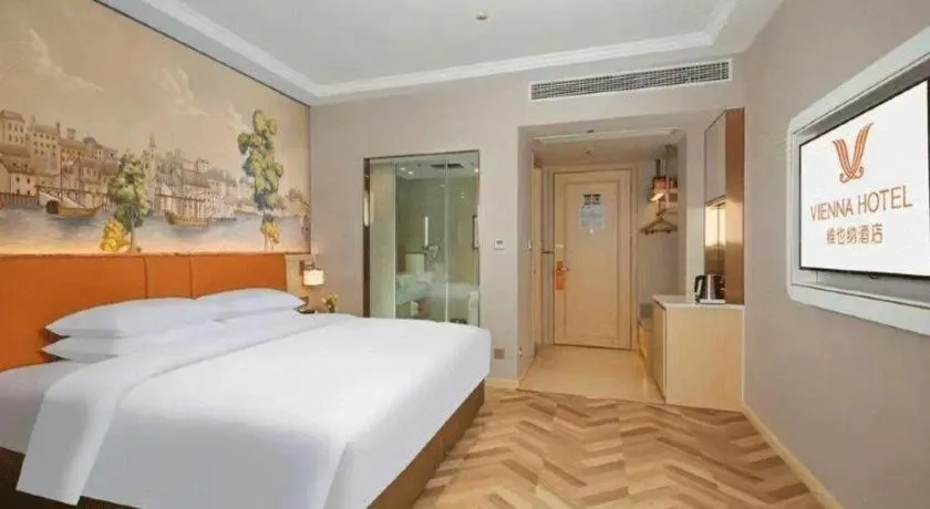 Bed in Vienna Hotel Chongqing Wushan Municipal Government