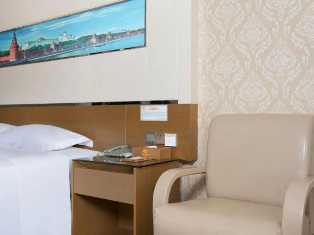 Bed in Vienna Hotel Guangdong Zhuhai Mingzhu Station Guozheng