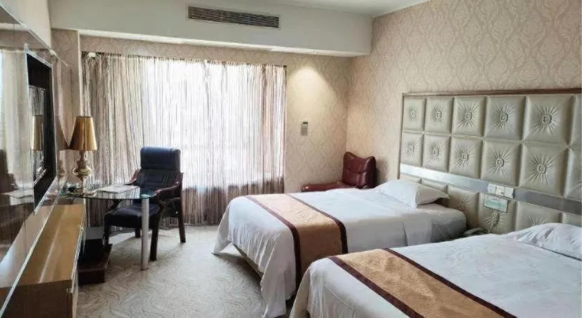 Bed in Vienna Hotel Guangdong Zhuhai Mingzhu Station Guozheng