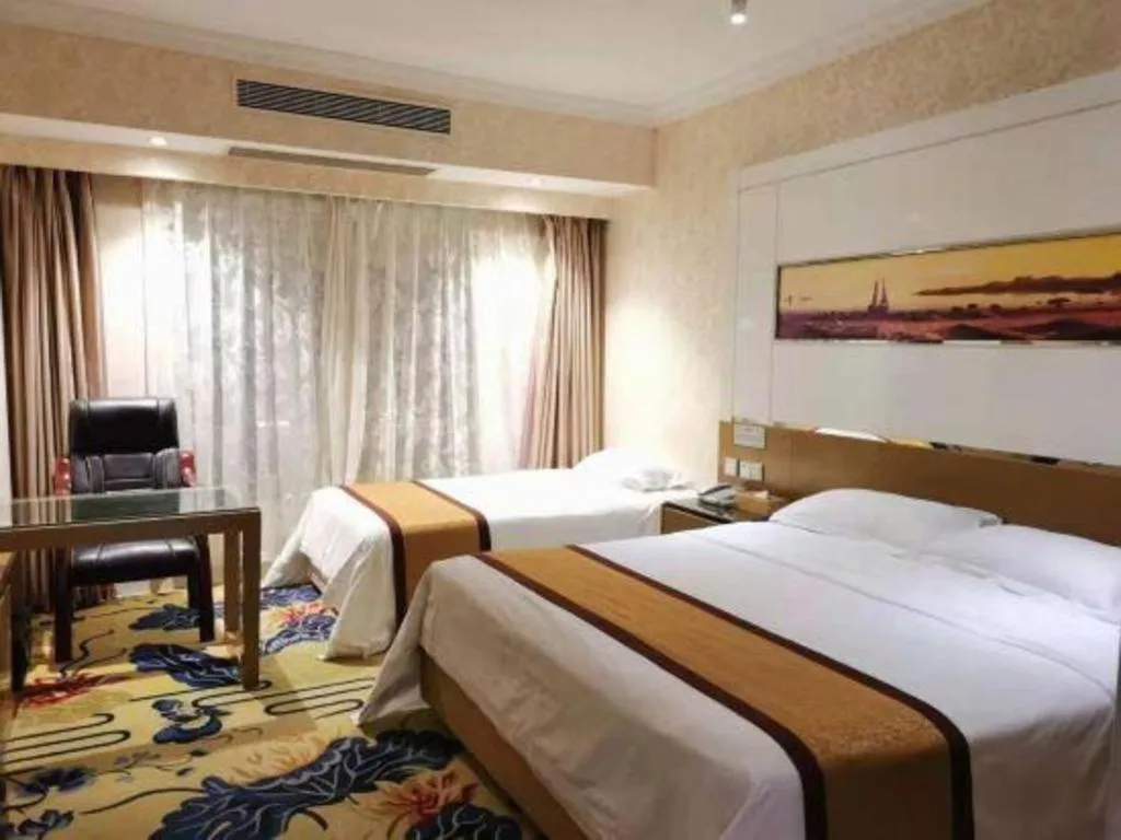 Bed in Vienna Hotel Guangdong Zhuhai Mingzhu Station Guozheng