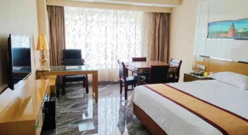 Bed in Vienna Hotel Guangdong Zhuhai Mingzhu Station Guozheng