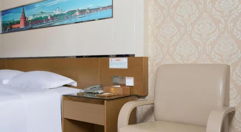 Bed in Vienna Hotel Guangdong Zhuhai Mingzhu Station Guozheng