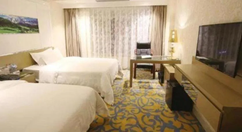 Bed in Vienna Hotel Guangdong Zhuhai Mingzhu Station Guozheng