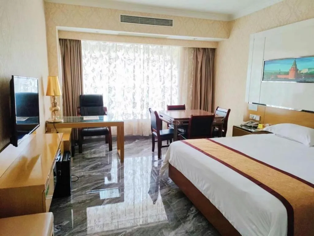 Bed in Vienna Hotel Guangdong Zhuhai Mingzhu Station Guozheng