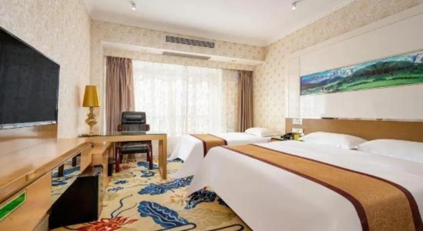 Bed in Vienna Hotel Guangdong Zhuhai Mingzhu Station Guozheng