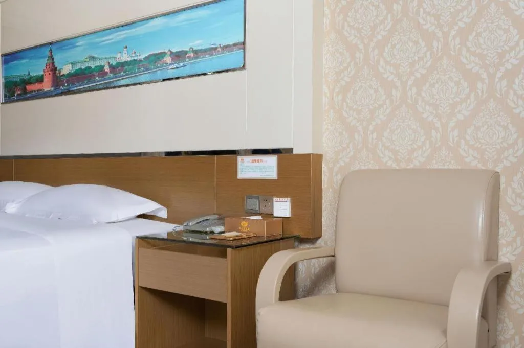 Bed in Vienna Hotel Guangdong Zhuhai Mingzhu Station Guozheng