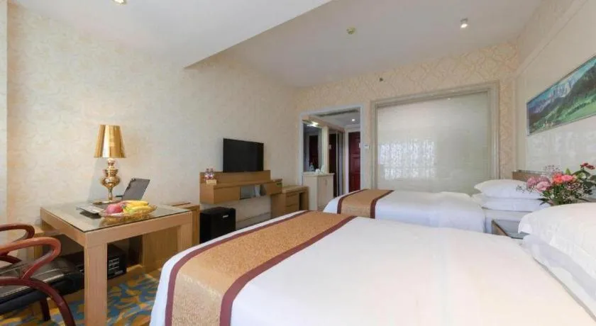 Bed in Vienna Hotel Guangdong Zhuhai Mingzhu Station Guozheng