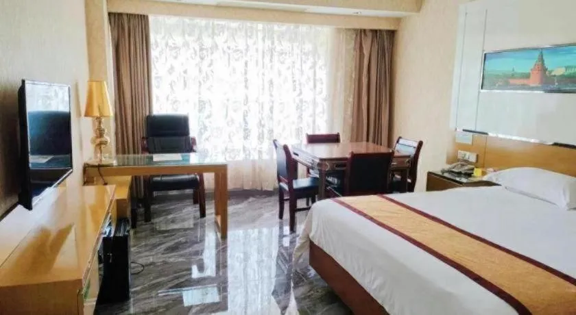 Bed in Vienna Hotel Guangdong Zhuhai Mingzhu Station Guozheng