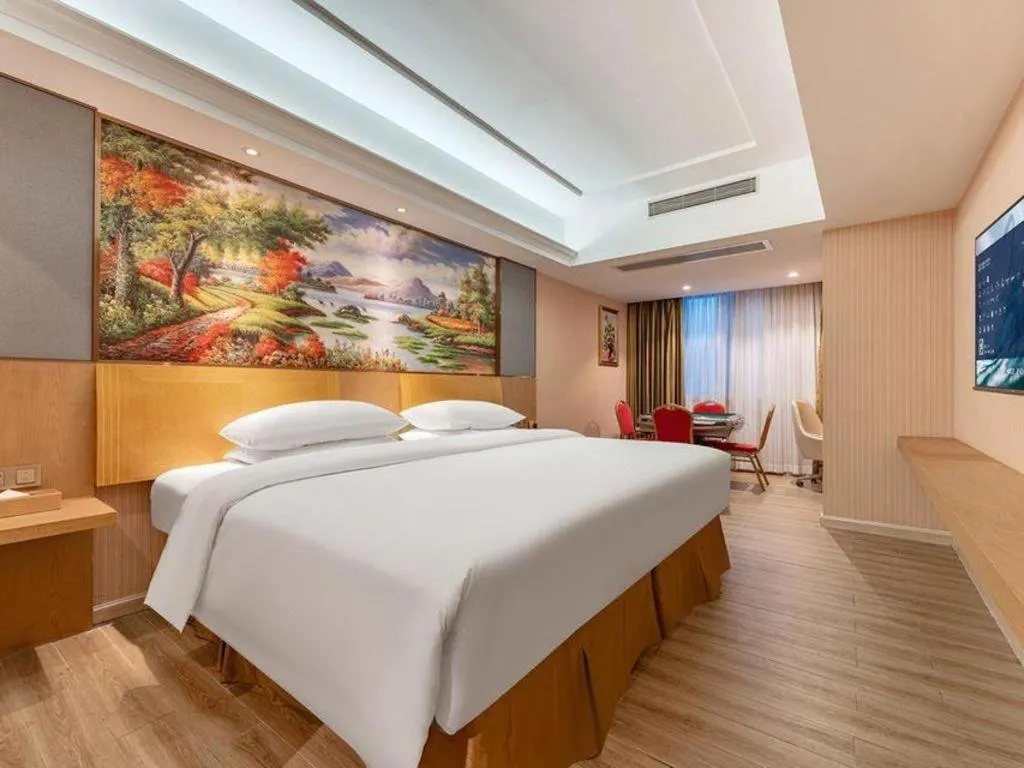 Bed in Vienna Hotel Guangzhou Baiyun Airport Huadu Avenue