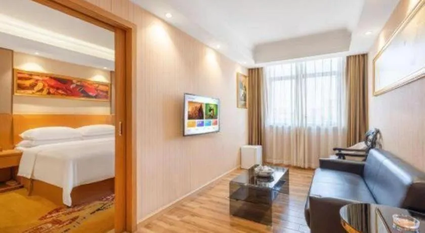 Bed in Vienna Hotel Guangzhou Baiyun Airport Huadu Avenue