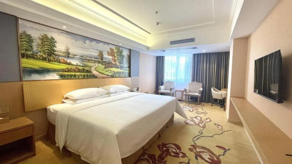 Bed in Vienna Hotel Guangzhou Baiyun Airport Huadu Avenue